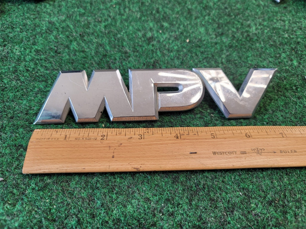 2000-2006 Mazda 'MPV' Rear Trunk Liftgate Chrome Emblem OEM LC63-51-720 1M4