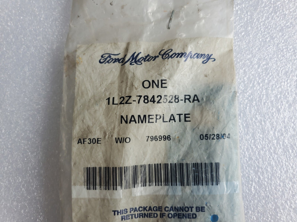 2002-2012 Ford Mercury Rear AWD Emblem Genuine New 1L2Z-7842528-RA 1L5