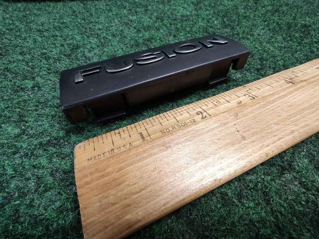 2006-2009 FORD FUSION DASH EMBLEM LOGO BADGE SYMBOL USED OEM 5S5