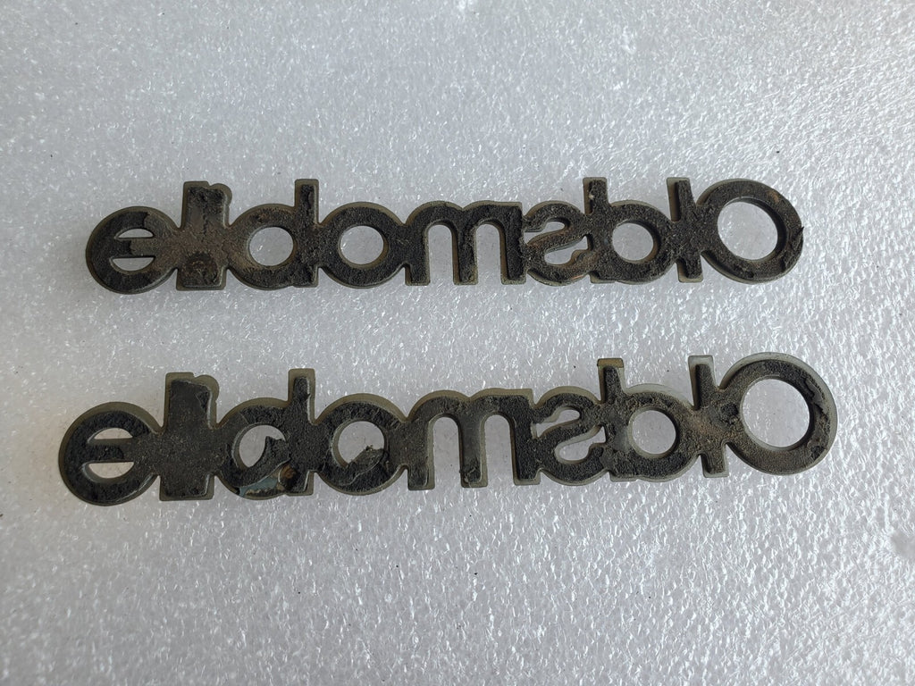 (2) Oldsmobile OEM Chrome Black 5.1" Emblem Badge Logo Nameplate Name Plate VNTG