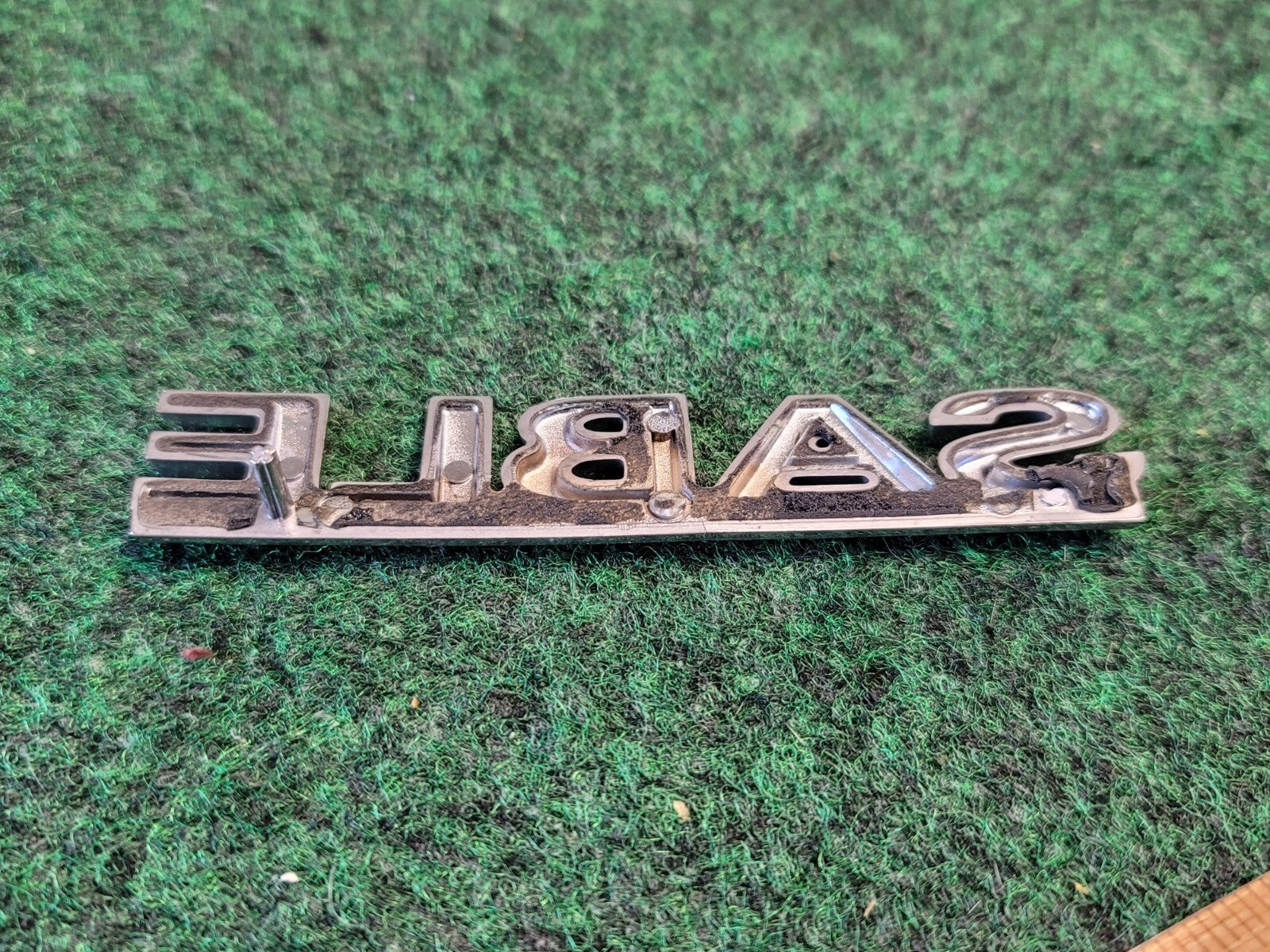 00 01 02 03 MERCURY SABLE REAR GATE LID EMBLEM BADGE SYMBOL LOGO OEM 1M6