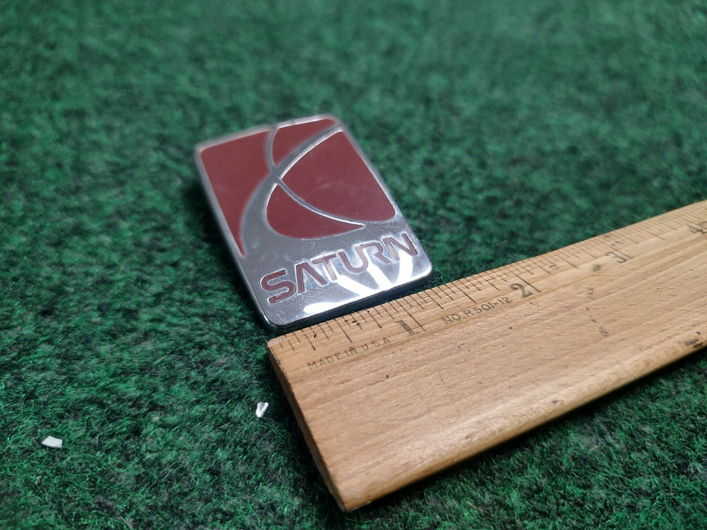 1991-1999 Saturn SL SL1 SL2 Front Bumper Emblem Badge Logo OEM 21111139 3S1