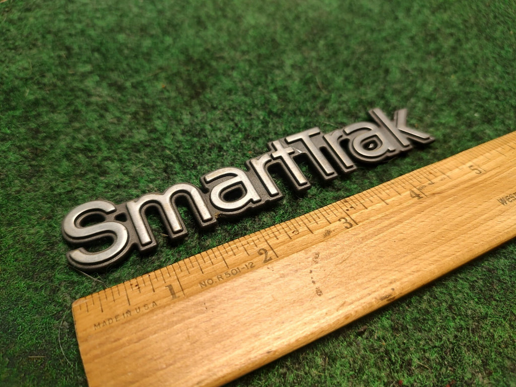 OLDSMOBILE SMART TRAK SMARTTRAK EMBLEM LOGO BADGE SYMBOL OEM USED 3S6