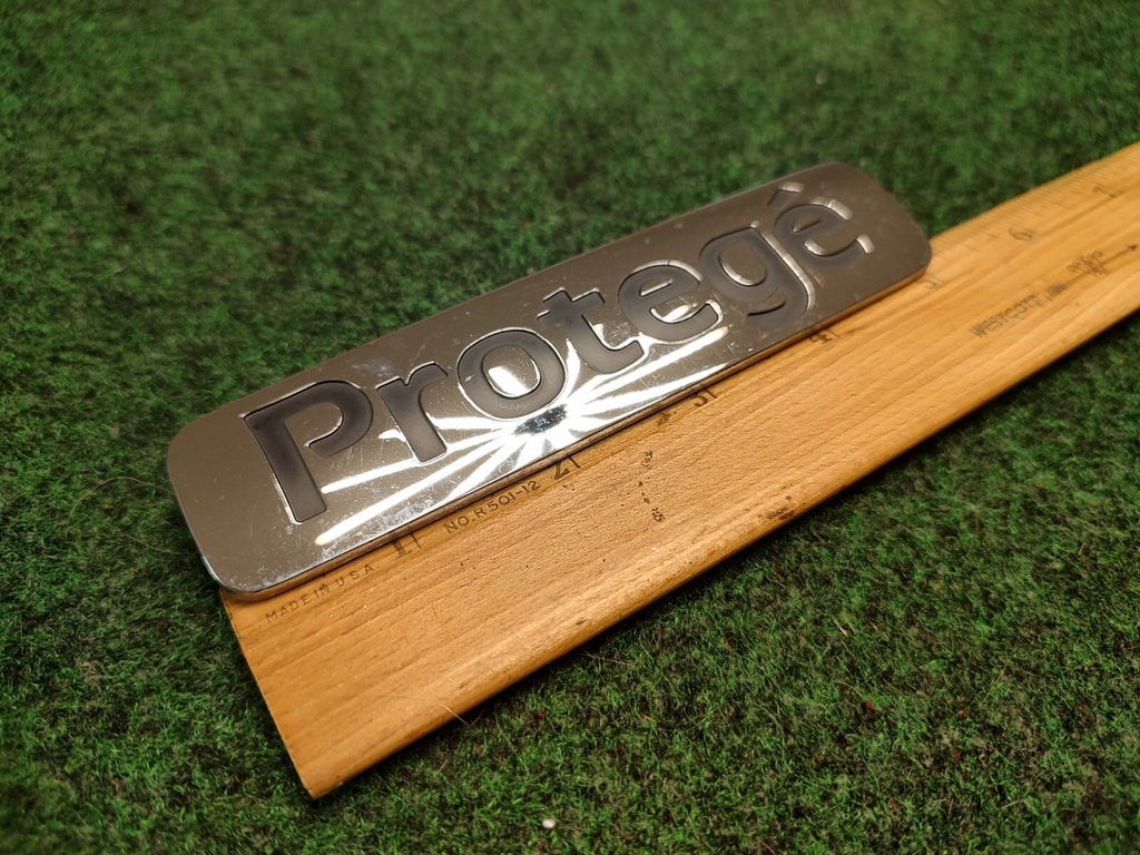 1999-2001 Mazda Protege Emblem Rear Lid Trunk Badge Logo Symbol Chrome OEM 2S3
