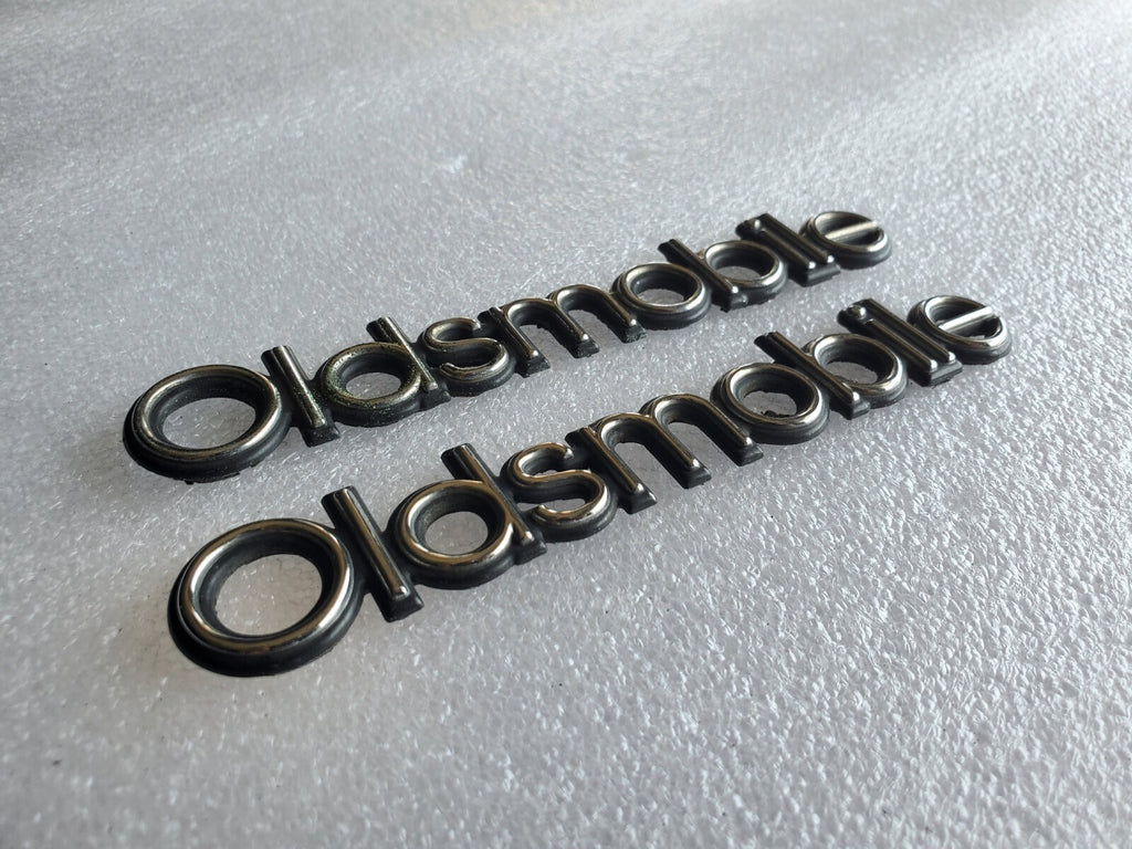 (2) Oldsmobile OEM Chrome Black 5.1" Emblem Badge Logo Nameplate Name Plate VNTG