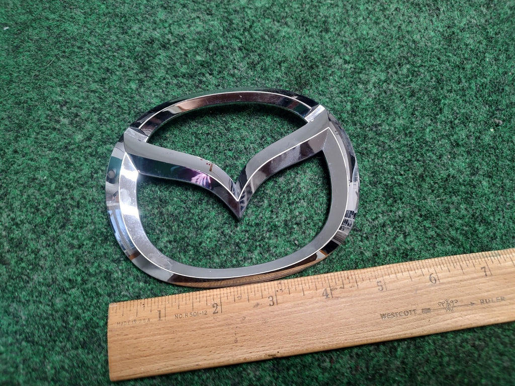 2004-2009 MAZDA 3 4DR SEDAN REAR TRUNK EMBLEM GENUINE NEW OEM BN8V-51-730A 1S1