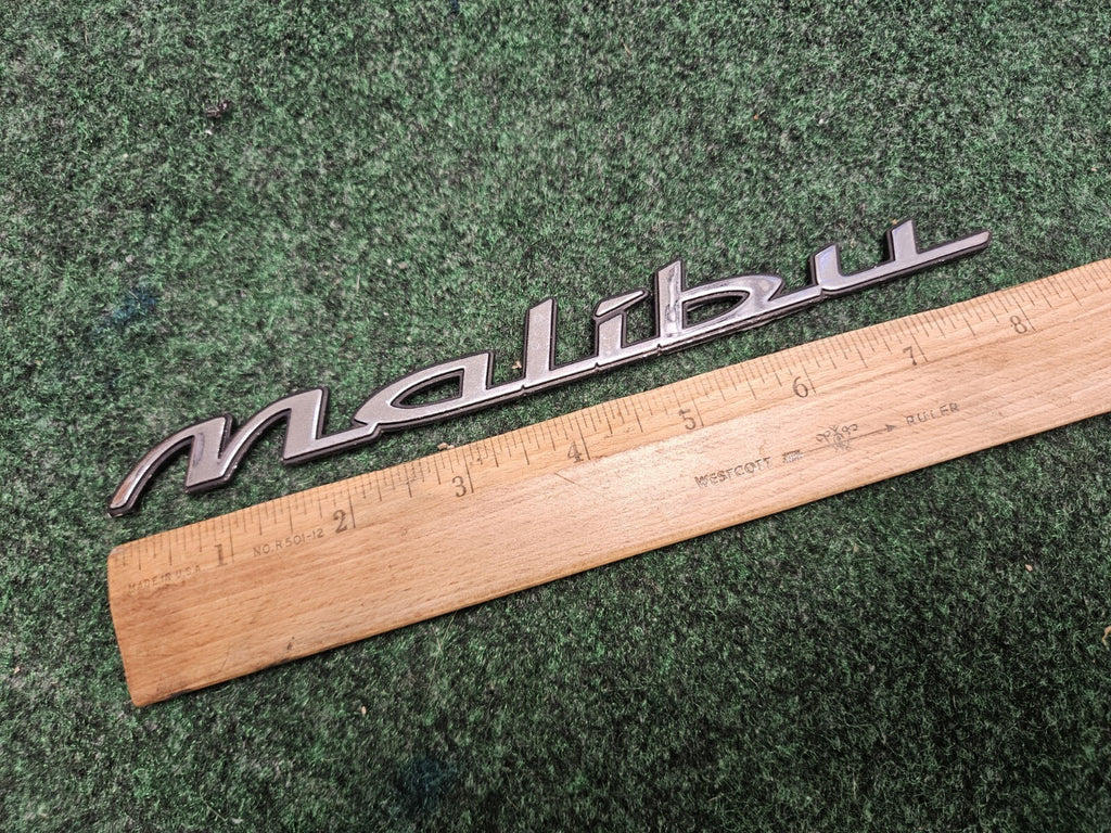 1997-2003 Chevy Malibu Chrome Rear Emblem Badge Logo Nameplate Name Plate 6M9
