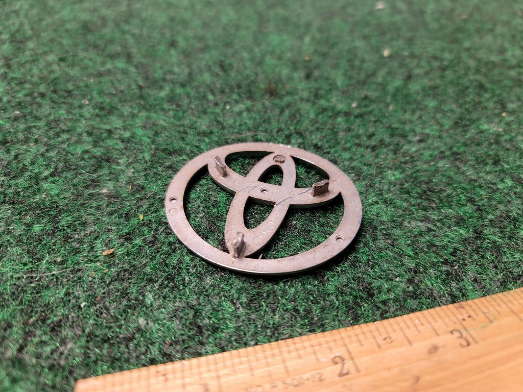 Toyota Chrome Plastic Emblem Badge Logo OEM 2" wide 10L3