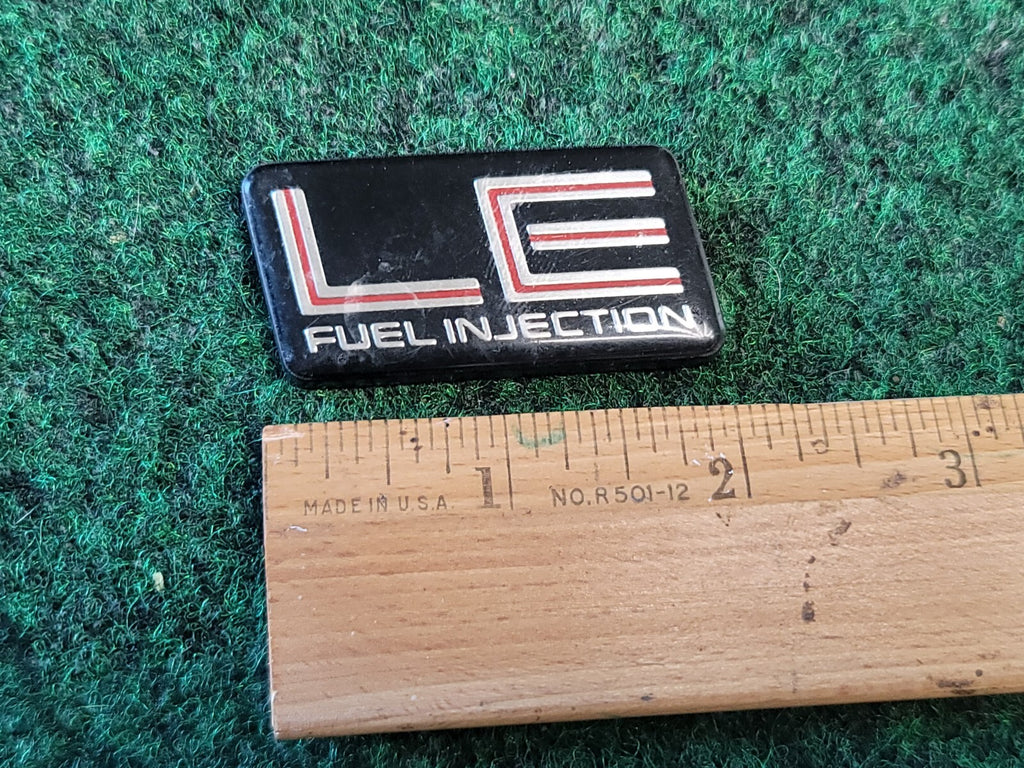 87 88 89 90 91 PONTIAC BONNEVILLE LE FUEL INJECTION EMBLEM LOGO BADGE OEM 1M5