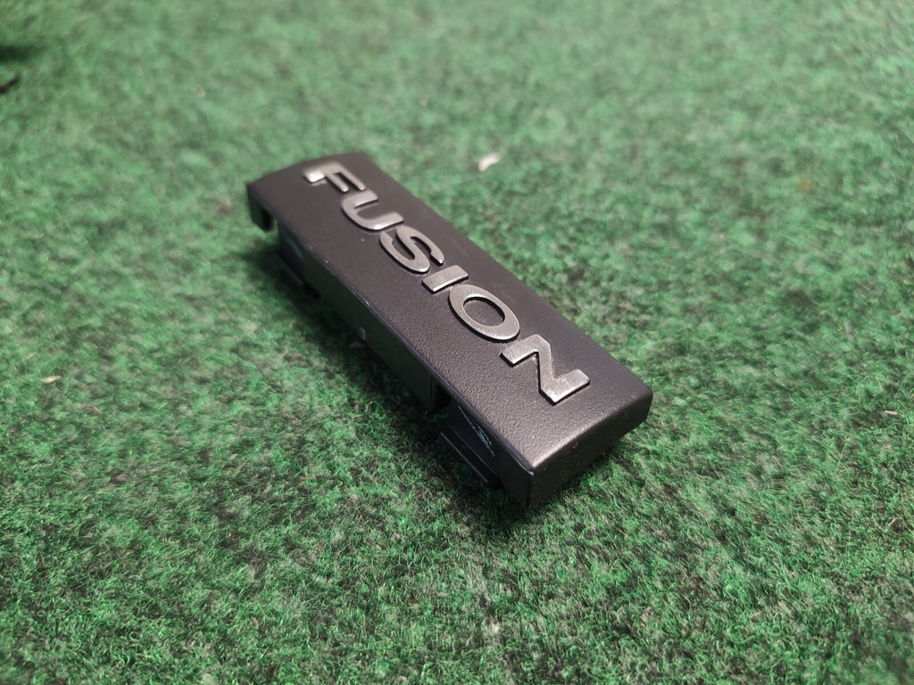 2006-2009 FORD FUSION DASH EMBLEM LOGO BADGE SYMBOL USED OEM 2S9