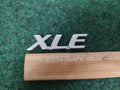 98 99 00 01 02 03 04 05 06 TOYOTA SIENNA XLE REAR EMBLEM LOGO BADGE USED OEM 1M4