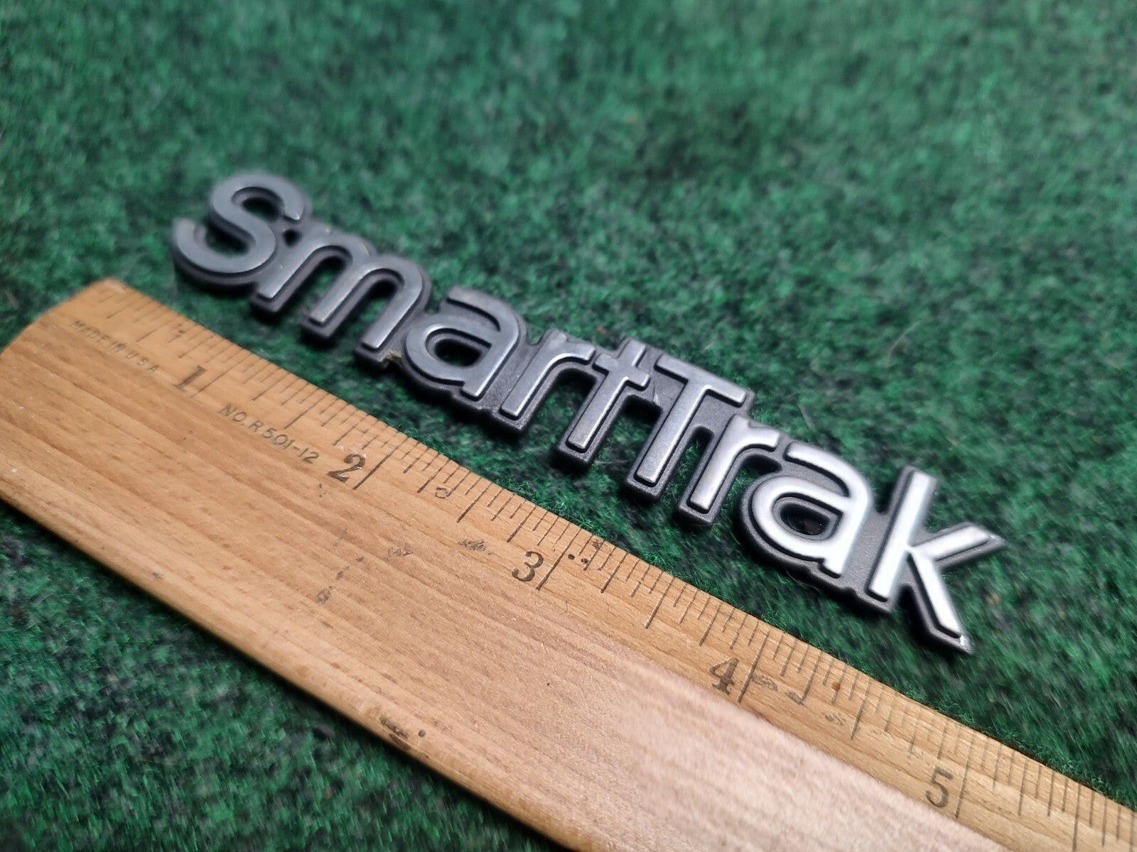OLDSMOBILE SMART TRAK SMARTTRAK EMBLEM LOGO BADGE SYMBOL OEM USED 3S6