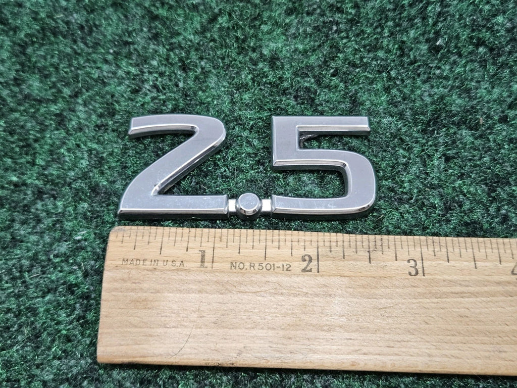 NISSAN 2.5 REAR CHROME EMBLEM LOGO SYMBOL BADGE OEM 7S8