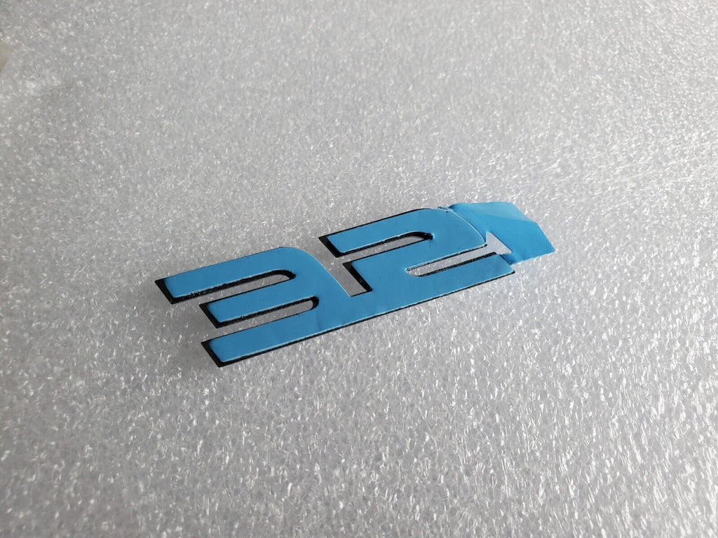 OEM Ford SE Emblem OEM XF2Z-1742528-AA  NEW 2L2