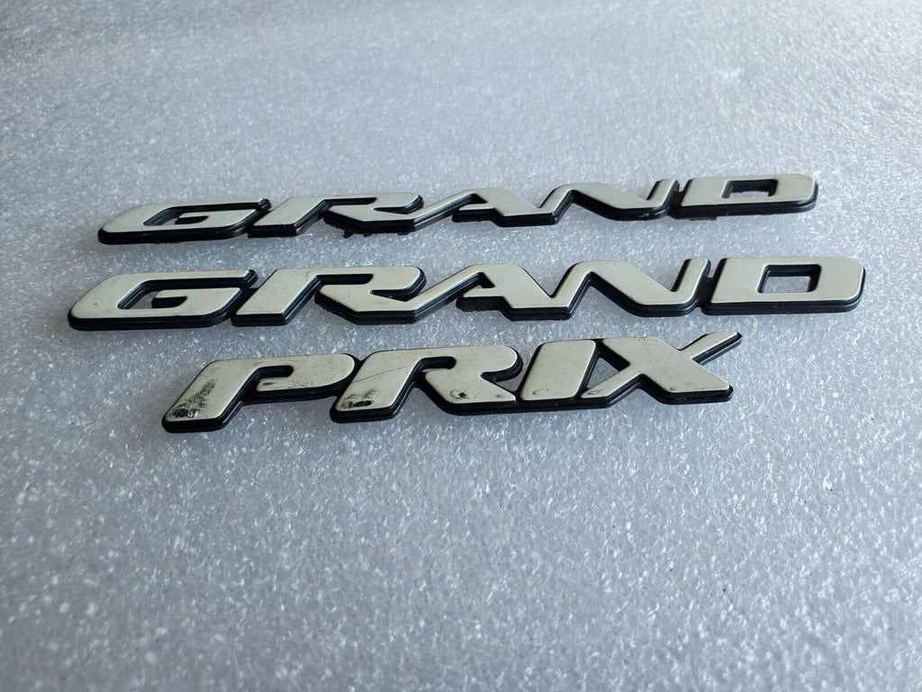 1997 2003 Pontiac Grand Prix Door Name Plate White NAMEPLATE OEM VNTG