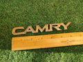 97 98 99 00 01 TOYOTA CAMRY GOLD REAR TRUNK EMBLEM ORNAMENT BADGE LOGO 1S1
