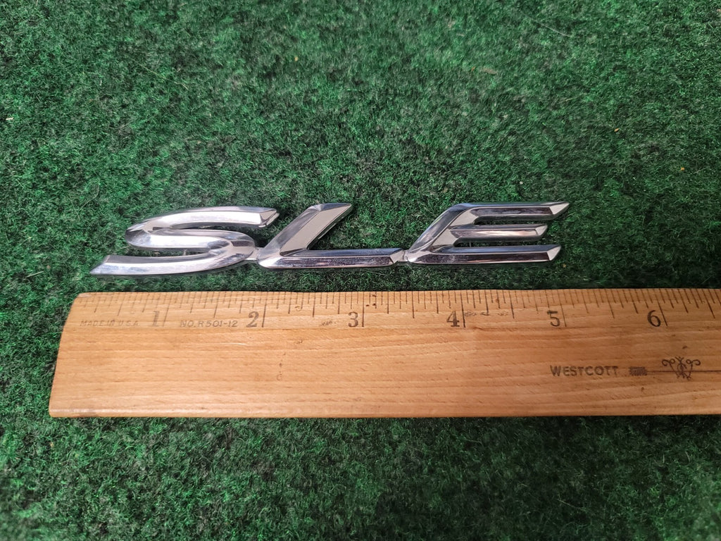 TOYOTA SOLARA SLE REAR LID Chrome EMBLEM LOGO BADGE SIGN  SYMBOL 5S8