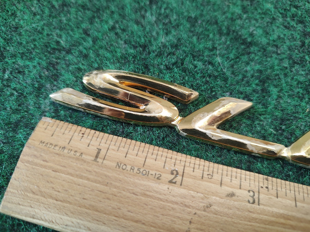 TOYOTA SOLARA SLE REAR LID Gold EMBLEM LOGO BADGE SIGN  SYMBOL 3S9