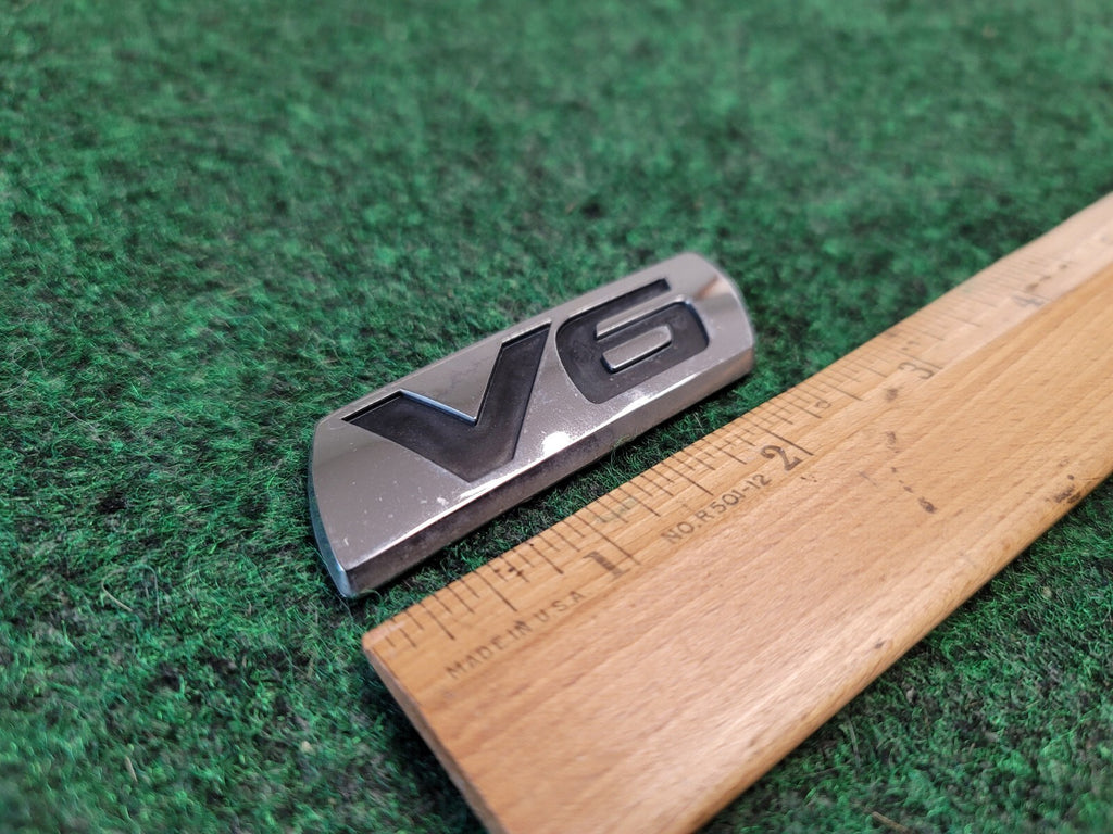 1998-2007 HONDA ACCORD V6 REAR EMBLEM BADGE SYMBOL OEM 7L1