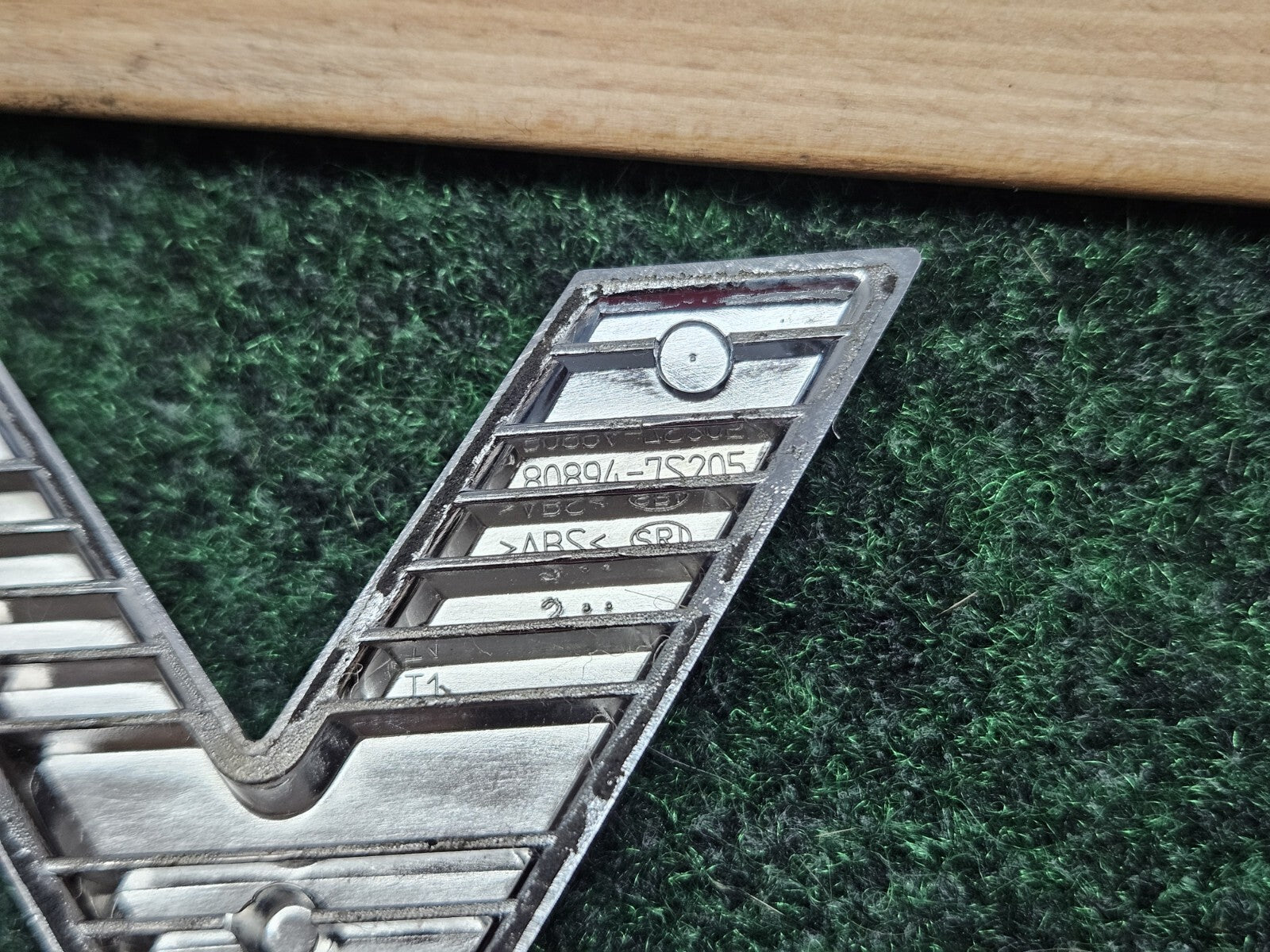 Nissan Titan V8 "V" ONLY Side Emblem Letters Badge OEM 80894-7S205 7S6