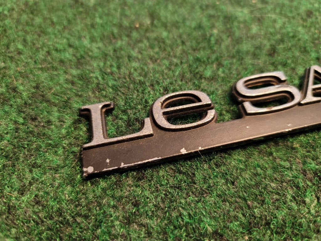 BUICK LESABRE CUSTOM - OEM EMBLEM BADGE SYMBOL LOGO NAME PLATE 9L6