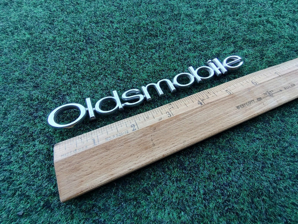 Oldsmobile OEM Chrome Emblem Badge Logo Nameplate Name Plate 10L4