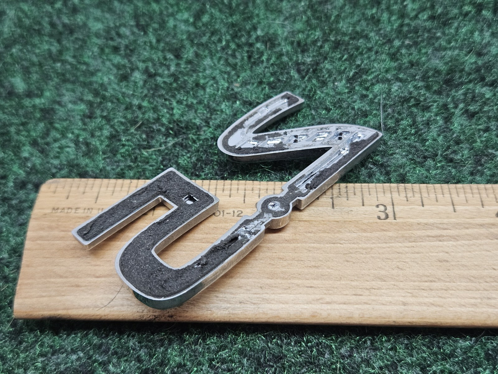 NISSAN 2.5 REAR CHROME EMBLEM LOGO SYMBOL BADGE OEM 7S7
