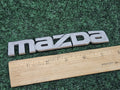 1999 00 2001 2002 2003 Mazda Protege Rear Trunk Nameplate Emblem B25D-51-710 GL1