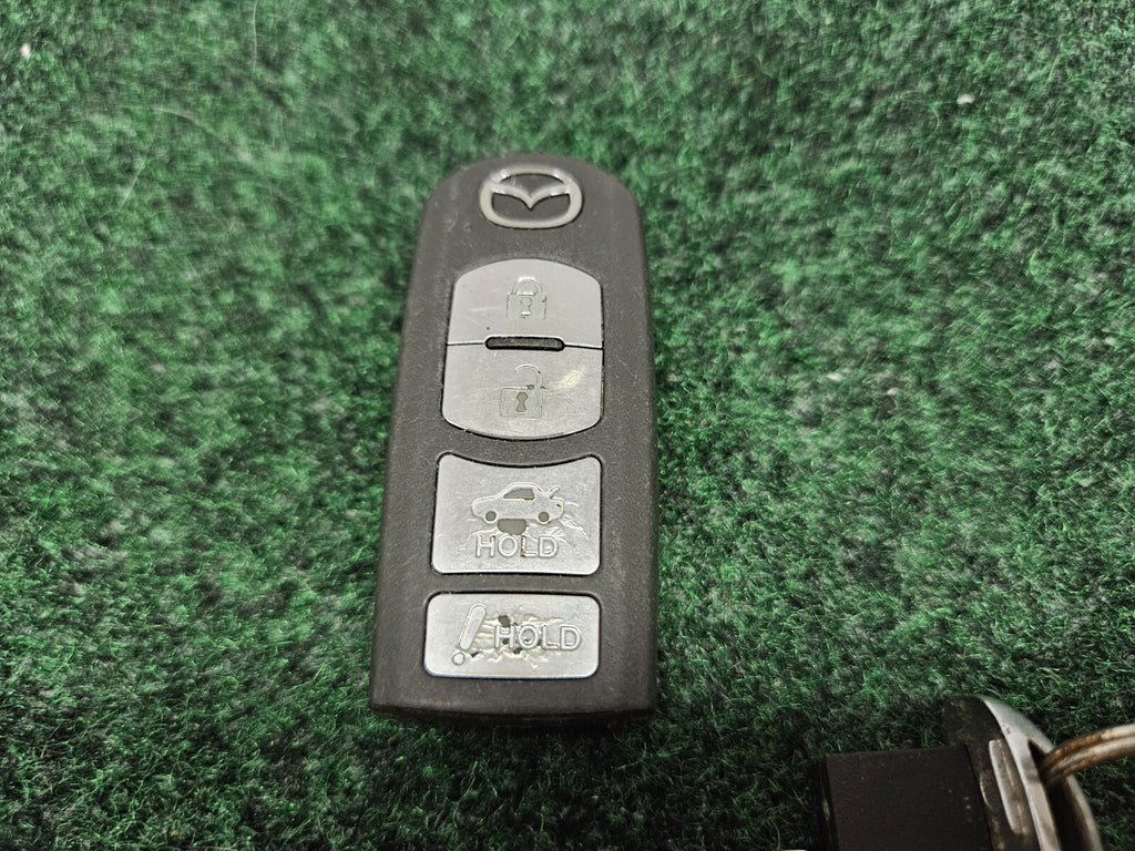 Mazda Keyless Entry Remote Fob KEYFOB OEM WAZSKE13D01 4 buttons Used  GL3