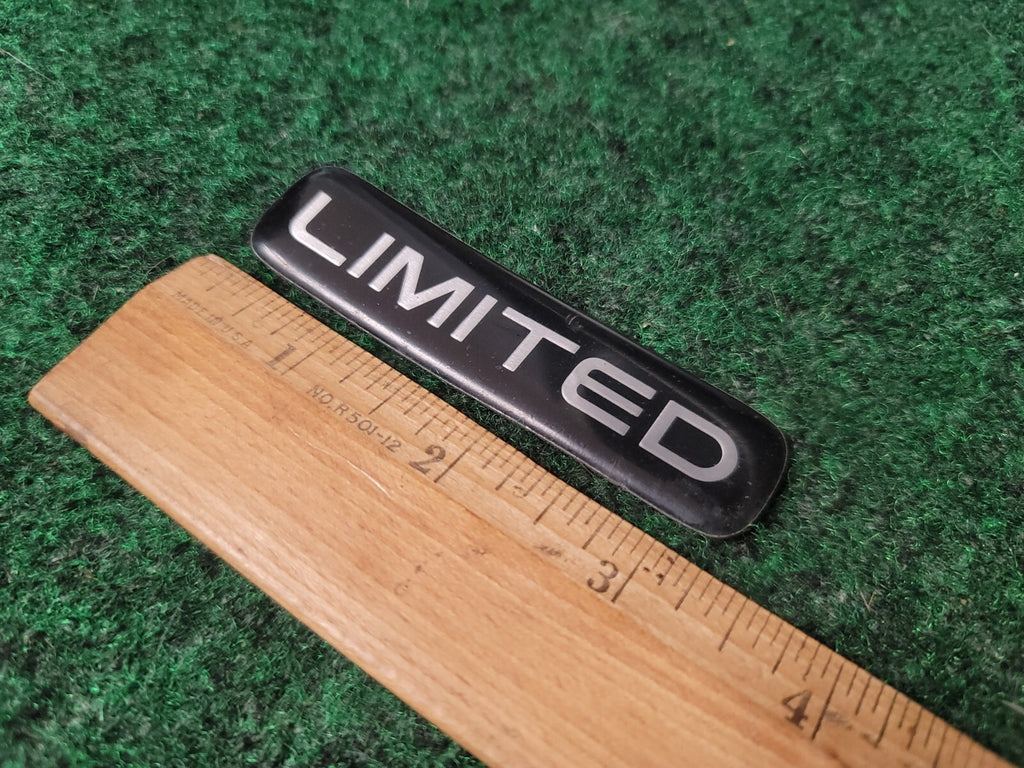 1999-2004 JEEP GRAND CHEROKEE LIMITED SIDE EMBLEM SYMBOL LOGO USED OEM 5S8