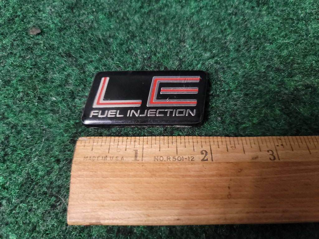 87 88 89 90 91 PONTIAC BONNEVILLE LE FUEL INJECTION EMBLEM LOGO BADGE OEM 5S2