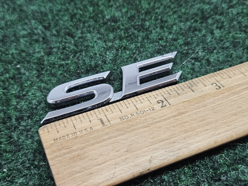 75443-06200 Toyota Se "Se" OEM Genuine USED EMBLEM 7S7