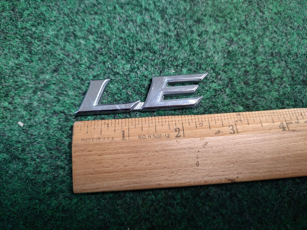 Genuine Toyota Camry  "LE" rear emblem Camry USED 75443-06180 fits 2007-2011 3S1