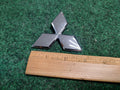 2002-2005 Mitsubishi Eclipse Rear Trunk Emblem Logo Nameplate MR971390 OEM 3S3