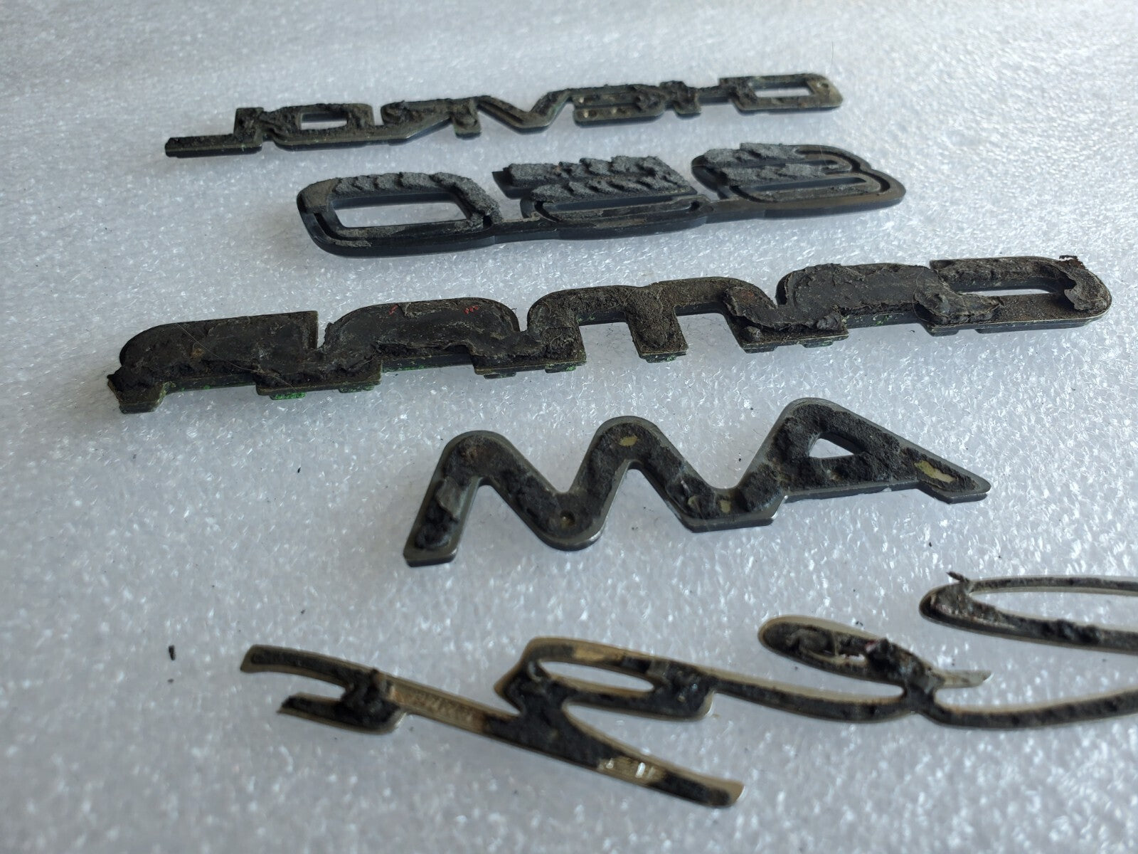 Misc Lot Of Emblwms Vintage Letters Logo OEM Mark VIII VOLVO Regal Camaro VNTG