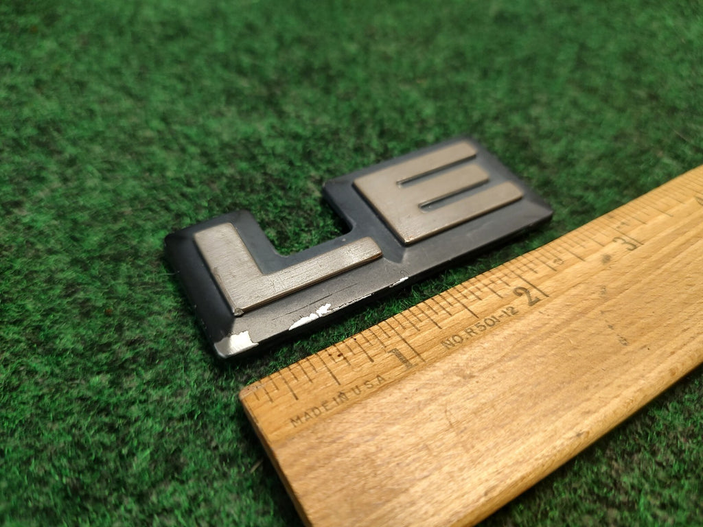 1987-1996 Dodge Dakota LE Cab Corner Emblem Name Plate Badge  55026887 4S9