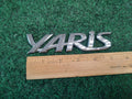 2006-2011 TOYOTA YARIS REAR EMBLEM LOGO BADGE SYMBOL CHROME LETTERS OEM 2S7