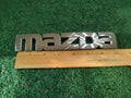 2000-2006 Mazda MPV Rear Emblem Name Plate LC62-51710 2S5