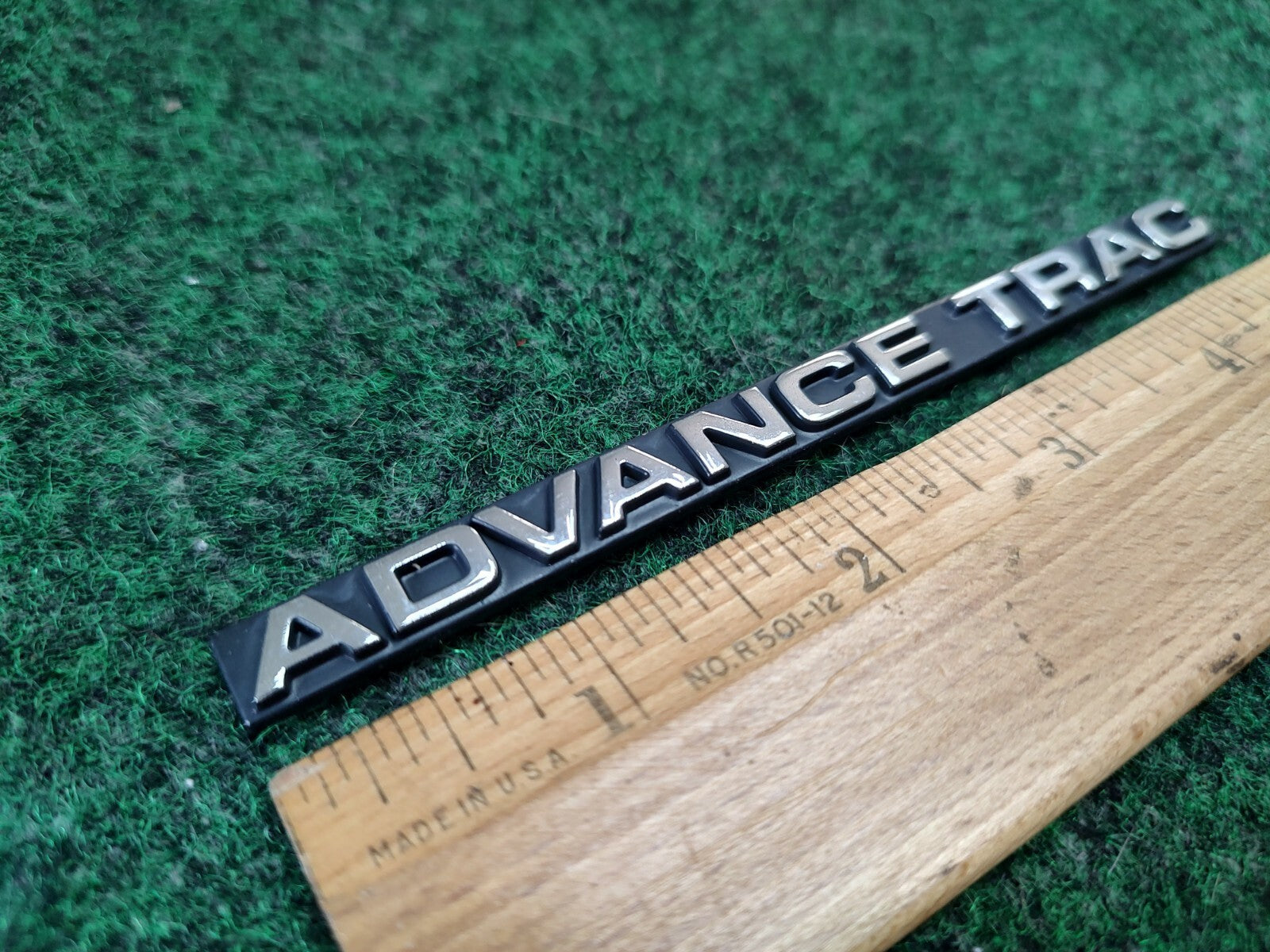 FORD LINCOLN MERCURY ADVANCE TRAC REAR EMBLEM LOGO SIGN OEM USED 4S1