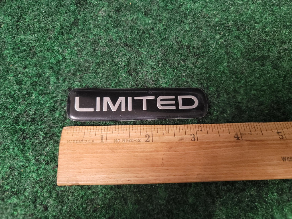 1999-2004 JEEP GRAND CHEROKEE LIMITED SIDE EMBLEM SYMBOL LOGO USED OEM 5S8