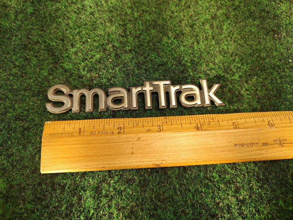 OLDSMOBILE SMART TRAK SMARTTRAK EMBLEM LOGO BADGE SYMBOL OEM USED 3S8