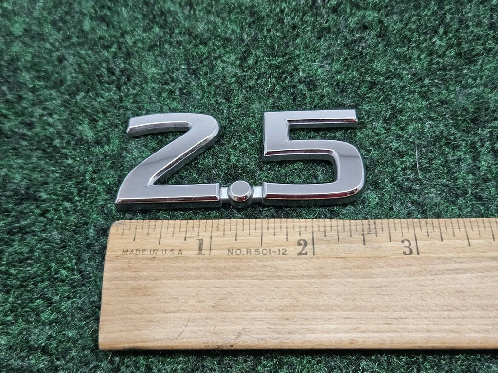 NISSAN 2.5 REAR CHROME EMBLEM LOGO SYMBOL BADGE OEM 7S7
