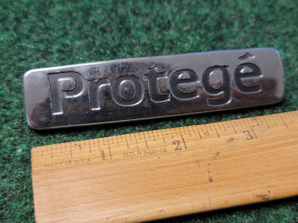 Mazda OEM 2001 2002 2003 Protege Sedan Rear Emblem Badge Logo Name 51 720 1M1