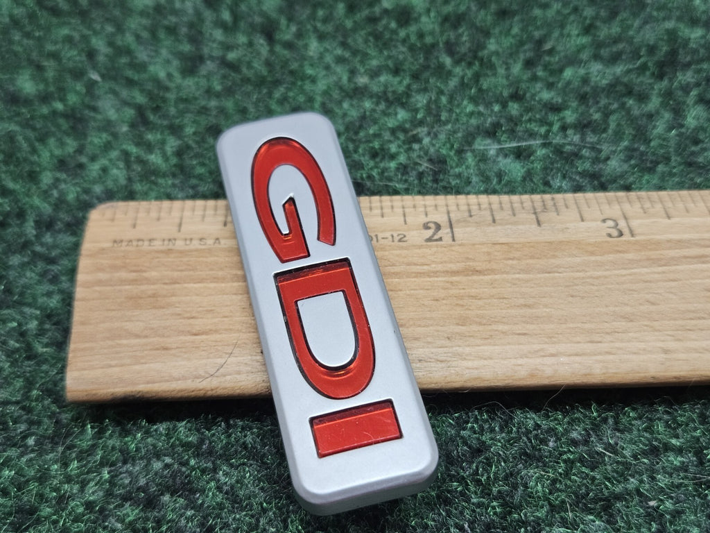 KIA SORENTO SPORTAGE OPTIMA RIO GDI REAR EMBLEM LOGO BADGE SYMBOL USED OEM 7S7