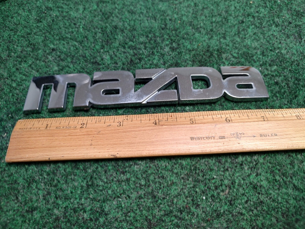 Mazda OEM Chrome Emblem Badge Logo Nameplate Name Plate ~7.25 Inches 4S4