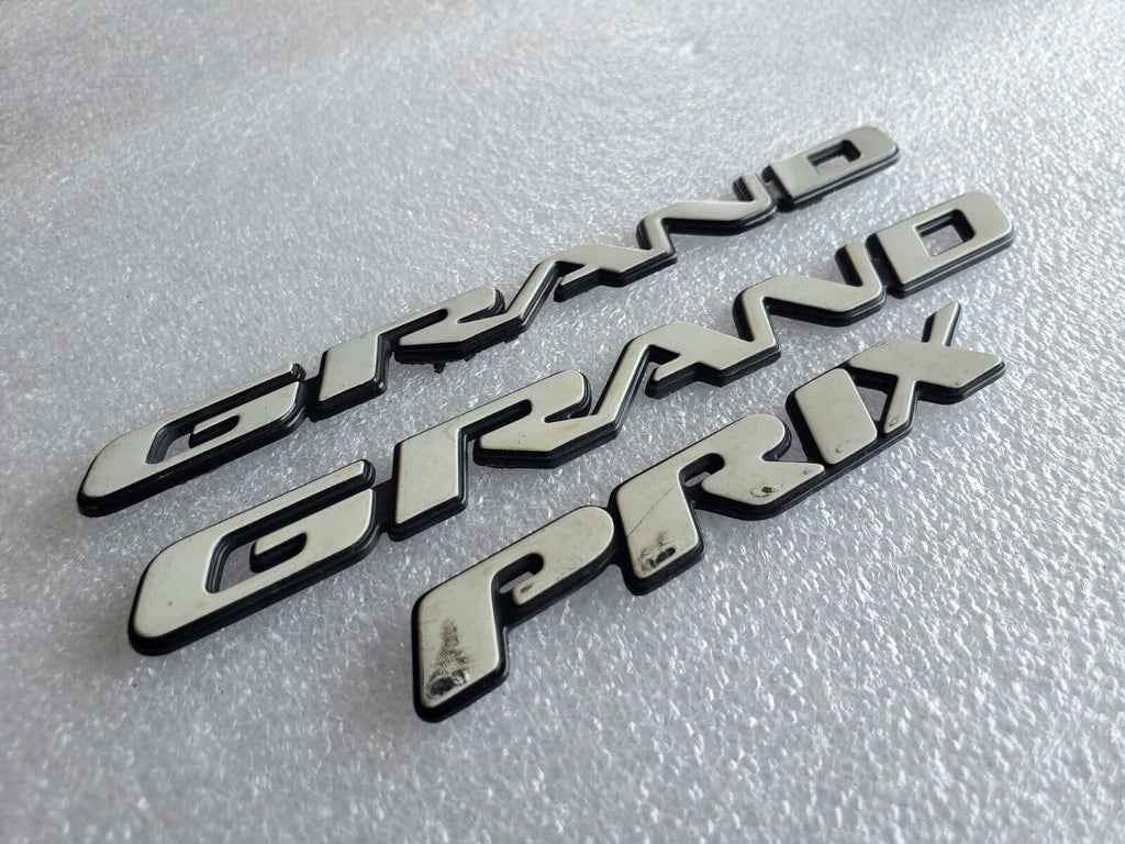 1997 2003 Pontiac Grand Prix Door Name Plate White NAMEPLATE OEM VNTG