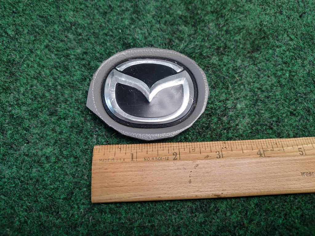 Mazda OEM Black Steering Wheel Horn Pad Emblem Badge Logo Name Plate 3S5