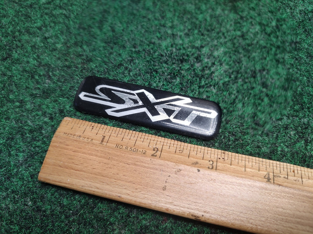 01 02 03 04 05 DODGE STRATUS SXT REAR EMBLEM BADGE SYMBOL LOGO DECAL OEM 1S1
