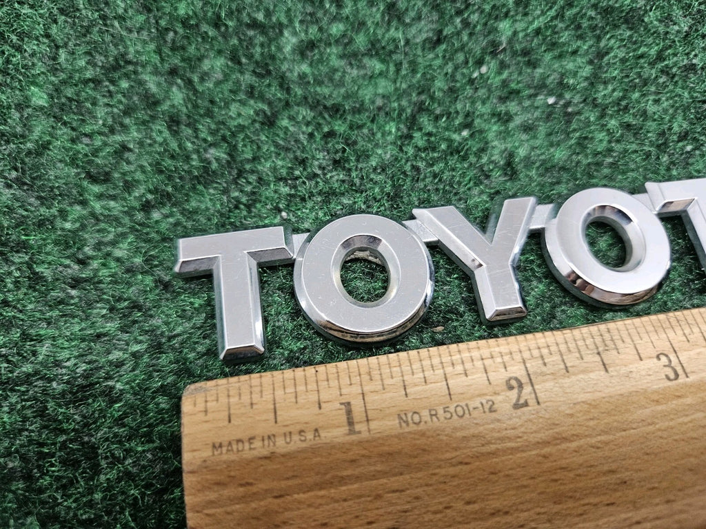 Genuine OEM Toyota 75442-16530 "TOYOTA" Trunk Emblem Badge Nameplate GL2