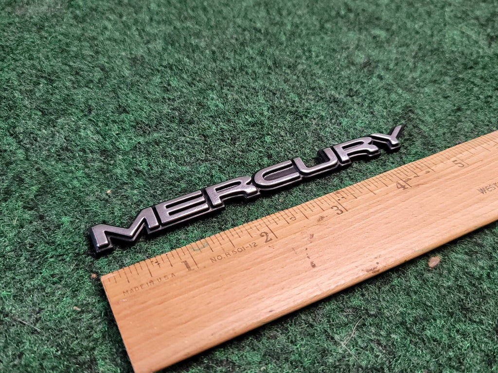 MERCURY GRAND MARQUIS GS CIRCA '99 REAR LIGHT EMBLEM  F8MB 5442550 AB 1M5
